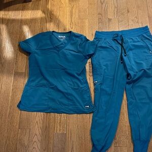 Greys Anatomy scrub set. Color dark blue